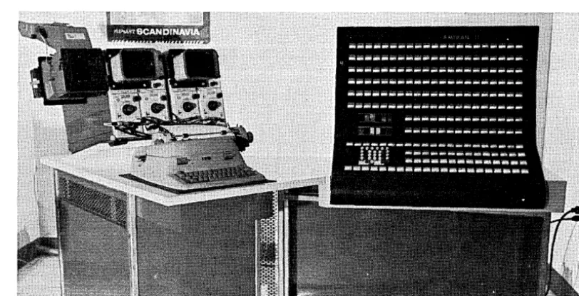 two 5-inch Fig. 1 and cathode ray storage oscilloscopes for graphical alphanumeric display, and a typewriter to provide a 