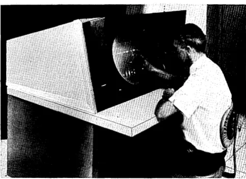 Fig. 1 Circuit designer at dd80 graphics console. 