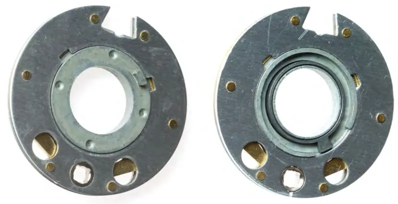 Figure 5: Wheels (front and back). Left: Front; note the drive pin protruding near the axis