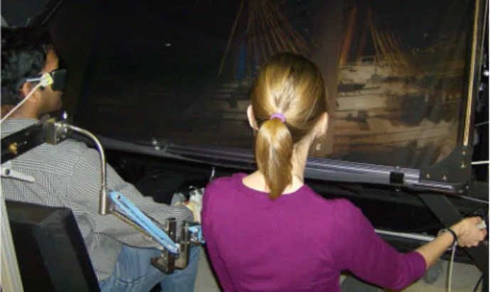 Fig. 1.  Both therapist and patient were correctly positioned in front of the  apparatus before performing simple reaching tasks