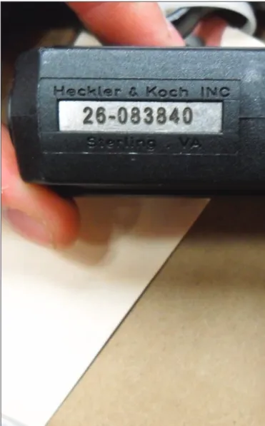Figure 7 Firearms carrying a combination of marks Figure 8 Use of metal tags for weapons with plastic receivers 