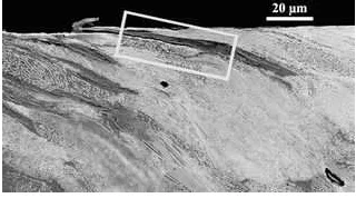 Figure 1.8: Micrograph of RCF defect propagating at an angle of approximately 