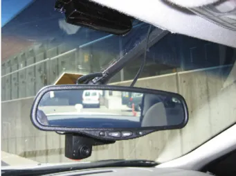 Fig. 1. View of the DriveCam event triggered video system located behind the rear-view mirror.