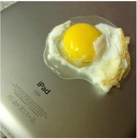 Figure 1.1: Image of a partially fried egg placed on an iPad by famous technologyblogger Robert Scoble who was satirising the iPad heat controversy via his Instagramaccount (http://statigr.am/p/151628232280579401_70).