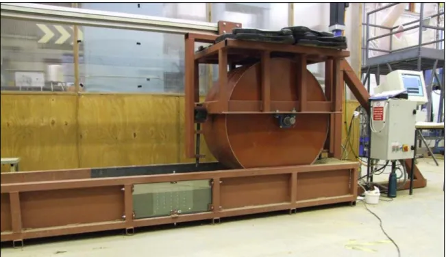 Figure 8 The Cranfield Cricket Rolling Simulator.  In this configuration a 1 m diameter roller is rolling  a 30% clay soil sample