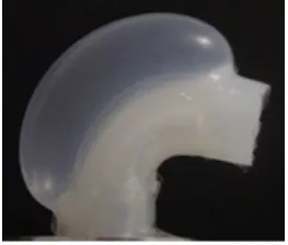 Figure 2.3: A STIFF-FLOP module bending due to applied air pressure (without sheathing that con-strains radial expansion) (Cianchetti et al., 2013)