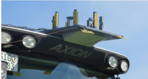 Figure 5. Uniform circular array prototype with 7 dipole elements,mounted on mowing machines roof