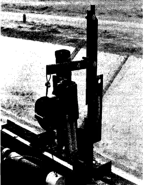 Figure 1–Direct-release, mechanical timer and gate release, or latch,for a dual-flinction combination gate.
