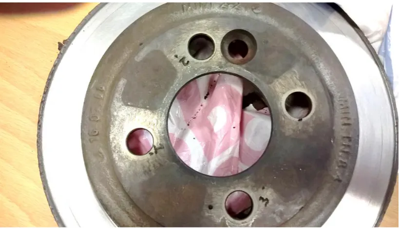 Figure 9. The sensor’s ground clip was attached to the conductive outer rim of the disc and the sensor was placed on each of the three areas as seen in Figure 10