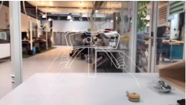 Figure 6: Start-up screen concept for the VirtuScope, hands animated to grab the handles 