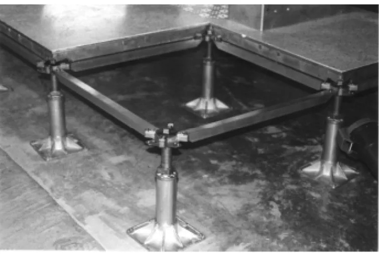 FIGURE 6-1 A Floor Grid System With Pedestals, Stringers, and Tiles
