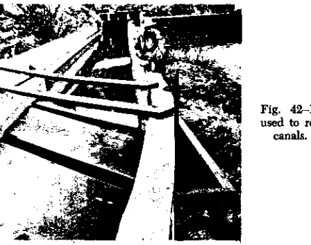 Fig. 42-12. Vortex tube sand trapused to remove sand and gravel from