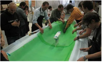 Fig. 13: Moulding work of a real-size sailing boat with the students. 