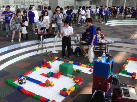 FIG. 3: Students remote control a LEGO EV3 robot to navigate a circuit