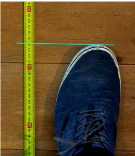 Figure 5. Example of how position of tip of foot is determined relative to tape measure from the camera image.