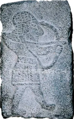Fig 5. An archer in the Assyrian reliefs (http;//www.britishmuseum.org) 