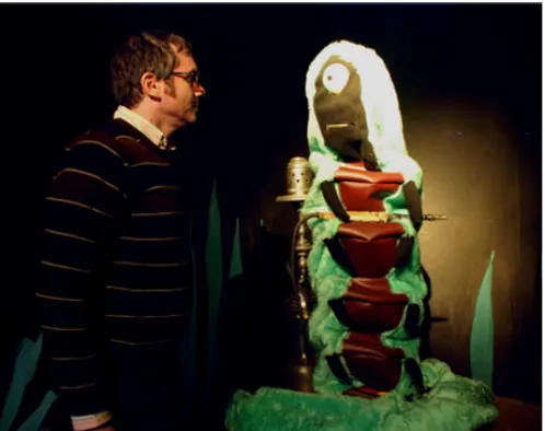 Fig. 6. A visitor talking to the caterpillar, a robotic dialogue agent [27, 28]. See Color Plate 5