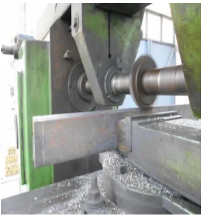 Fig. 3. V-groove making on milling m/c. 